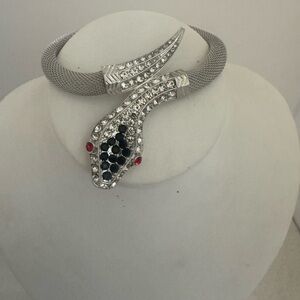 Elegant Silver Snake Bracelet with Crystal Accents